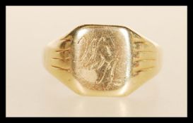 A hallmarked 9ct gold signet ring. Weight 4.3g. Hallmarked birmingham 1986. Size U.