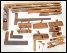 A good collection of vintage 20th Century wood working tools to include a selection of plains,
