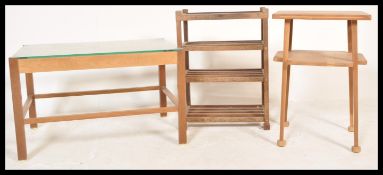 A collection of three pieces of retro scratch built furniture to include a coffee table with drop in