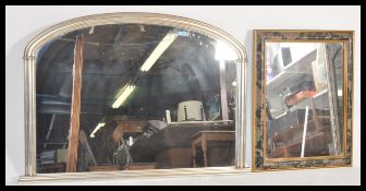 A large contemporary silvered framed mirror of oval form in the Victorian manner together with