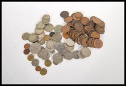 A collection of vintage coins dating from the 19th and 20th Century to include Half Crowns, 50p