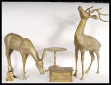 A collection of 20th Century brass wears to include a pair of deer figures including a stag and a