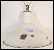 A vintage retro 20th Century industrial factory pendant shade by Benjamin having a white enamel