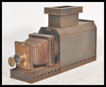 A good early 20th century Gaumont brass and tin plate magic lantern slide viewer, brass lens and