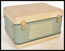 A vintage mid 20th Century two tone portable reel to reel player by Revox, built in speaker lift off