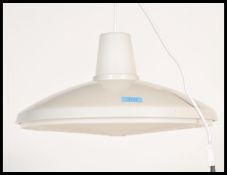 A vintage retro 20th Century ceiling light lamp fixture of UFO shape finished in white withy a