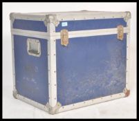 A vintage retro 20th Century large flight case steamer trunk of square form in a blue colouring.