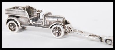 A sterling silver 925 clip pendant in the form of an early 20th Century classic old timer car.