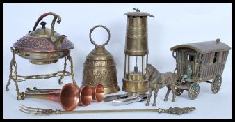 A collection of vintage and antique copper and brass metal wares to include a brass large horse