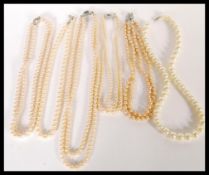 A collection of vintage 20th Century graduating pearl bead necklaces complete in vintage jewellery