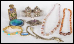 A collection of vintage jewellery to include a French gilt metal perfume bottle, marcasite and