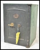 A good 19th century large Industrial cast iron safe by T Withers & Son of West Bromwich. The safe
