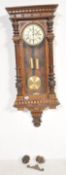 A 19th Century Victorian walnut ' Vienna ' regulator wall clock, the eight-day duration having a