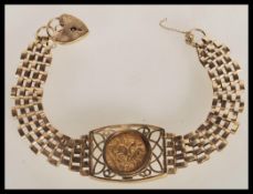 A 9ct gold 375 hallmarked gentleman's bracelet inset with 1909 Edward VII half sovereign coin.