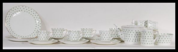 A vintage retro Art Deco 1930's Heathcote china tea service in the Blossom pattern, having a white