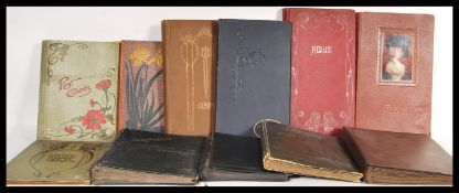 A collection of ten early 20th Century Edwardian postcard albums. (empty) Tallest measures 38cm high