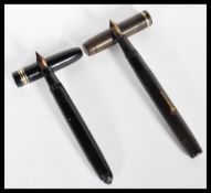 A vintage 20th Century Mabie Todd Swan fountain ink pen with a 14ct gold nib together with a