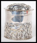 A 19th Century Victorian Art Nouveau hallmarked silver lidded pot by William Comyns & Sons having