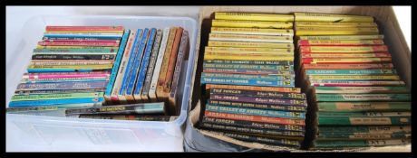 A large collection of paperback fictional books by Edgar Wallace, several titles and publishers to