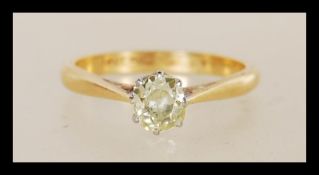 An 18ct carat gold single stone diamond solitaire ring having an old cut diamond of approx 50 pts.