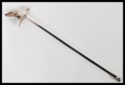 A 20th Century hallmarked silver Art Deco cocktail swizzle stick having a m]large dove bird finial