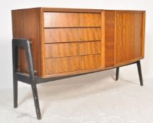 A vintage mid 20th Century bow fronted teak wood - tola wood sideboard / credenza, a bank of three
