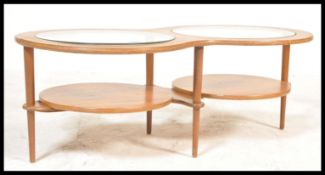 A vintage retro 20th Century teak double circle glass table having two circular inset glass tops