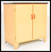 A vintage retro mid 20th Century 1950's / 1960's kitchen cabinet having a white enamelled counter