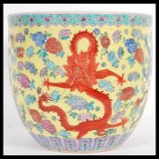 A large 19th century Chinese brush pot / vase having famille Jaune enamelled ground with