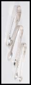 A group of three early 19th Century Georgian hallmarked silver sugar tongs or nips comprising of