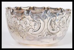 A 19th Century Victorian hallmarked silver bowl by James Dixon & Sons Ltd having a scalloped edge