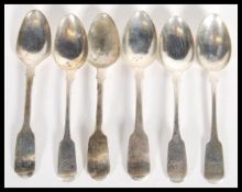A group six hallmarked silver Georgian early 19th Century teaspoons to include a set of three