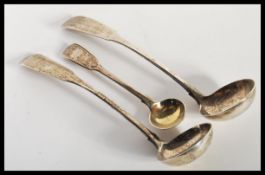 A group of early 19th Century Georgian hallmarked silver sauce or chocolate ladles to include a pair