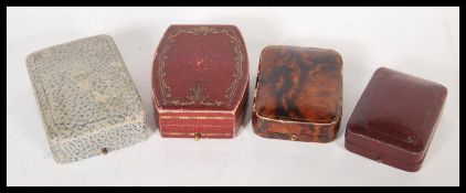 A selection of vintage jewellers jewellery boxes to include four earring boxes having a faux leather