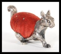 A 19th Century Victorian silver plated novelty pin cushion depicting a squirrel in the manner of