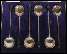 A set of six early 20th Century hallmarked silver coffee or tea spoons having octagonal scalloped