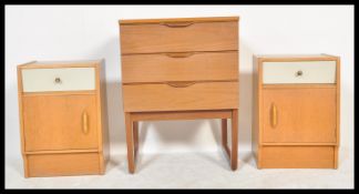 A pair of mid 20th Century oak Ernst Gomme for G Plan true bedside cabinets, single drawer over