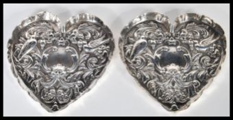 A 19th Century Victorian Art Nouveau pair of hallmarked silver pin dishes of heart shape by