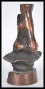 A vintage 20th Century bronze / bronzed metal glasses holder in the form of a nose in the manner