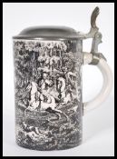 A 19th Century Continental transfer printed stein, the stein decorated with a hunting scene
