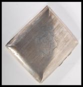 An early 20th Century Edwardian cigarette case by Joseph Gloster. The cheroot case of square cushion