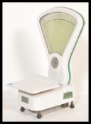 A set of vintage retro 1960's confectioners sweet shop scales by Warmington, having a white