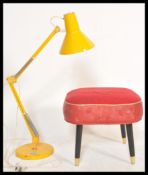 A vintage retro 20th Century 1001 Lamps orange anglepoise industrial desk lamp along with a