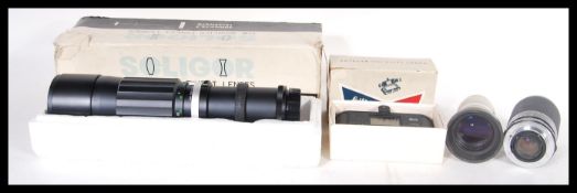 A collection of camera lenses to include a Sony TV Zoom lens f12.5-75mm, a Carl Zeiss Jena lens