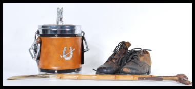 A 20th century novelty equestrian ice bucket having a faux leather finish with a horse finial and