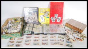 A large collection of approx 1000 vintage 20th Century cigarette and tea cards containing many