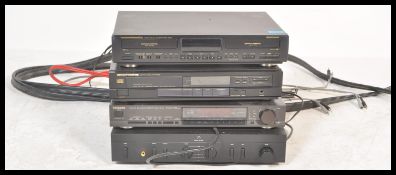 A stacking music entertainment system in four parts,consisting of a Marantz Stereo double cassette