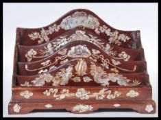An early 20th Century Chinese hardwood desk stand letter rack tidy having mother of pearl inlay