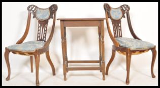 A pair of early 20th Century Edwardian mahogany Aesthetic movement dining chairs, the chairs with