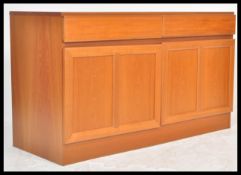 A vintage retro 20th Century Macintosh teak low sideboard credenza unit having two drawers flanked